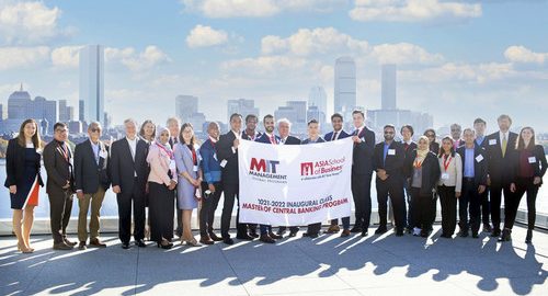 MIT Sloan School of Management Dean David Schmittlein (fourth from left), MIT Sloan Global Programs Assistant Dean David Capodilupo (second from right), and MIT Sloan faculty and staff welcome the inaugural class of the Asia  School of Business Master of Central Banking Program at MIT Sloan on November 8, 2021.